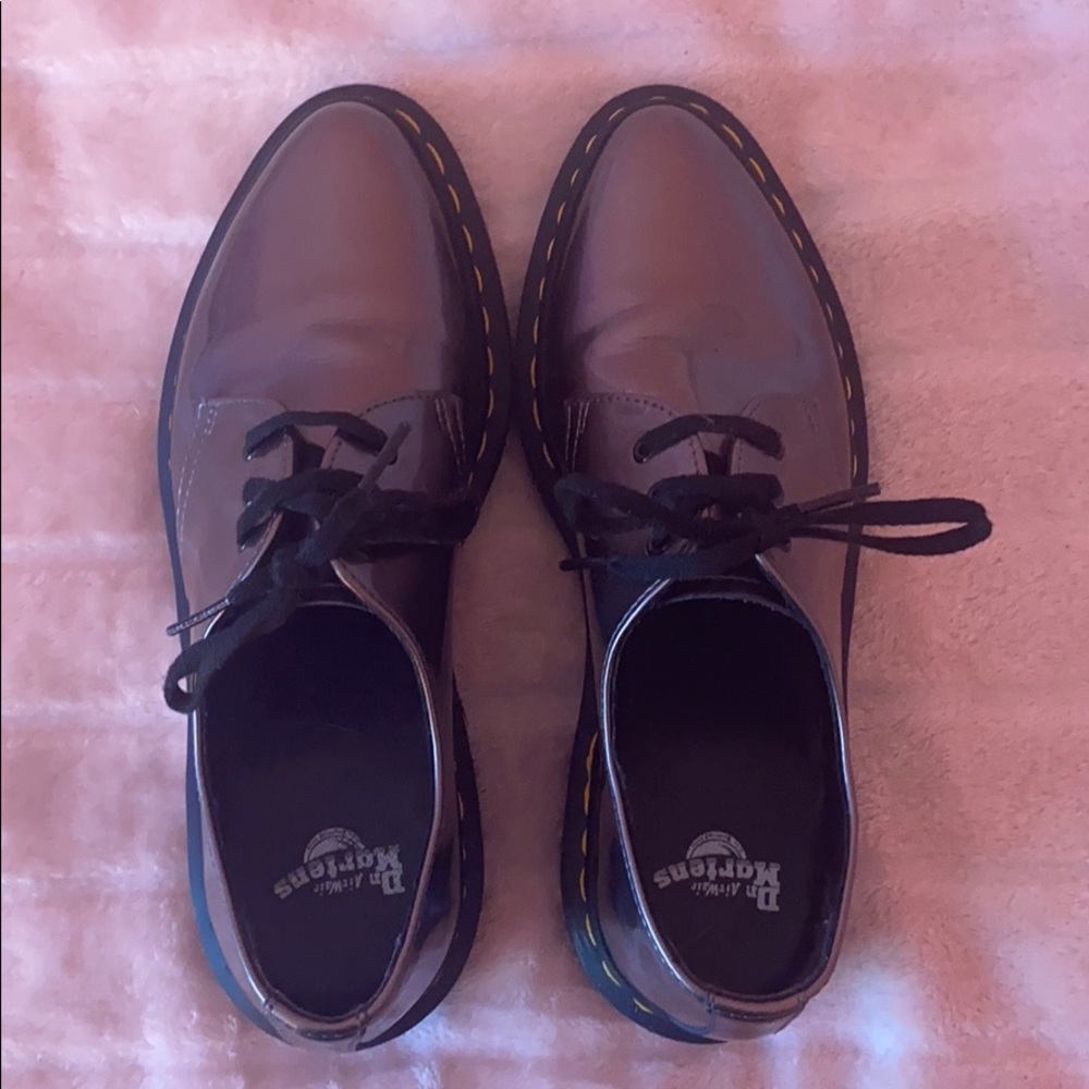 Super cute, metallic silver Dr. Marten’s shoes.